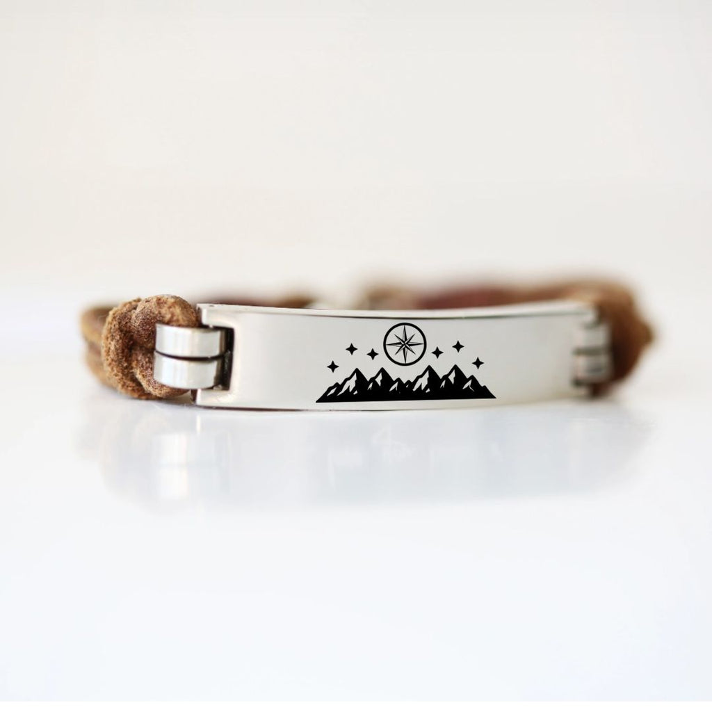 Leather promise bracelet with a silver clasp and engraved promise symbol on a white background.